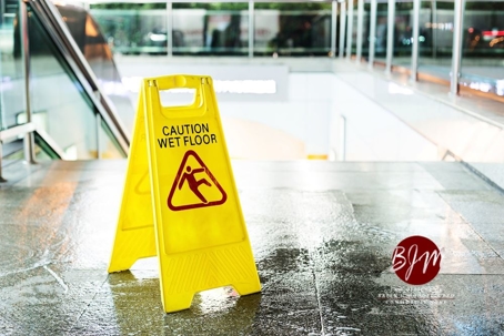 Caution Wet Floor Sign on Walkway